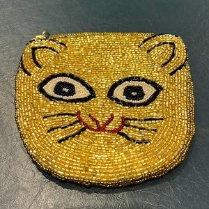 Urban Outfitters gold beaded clutch (like new)